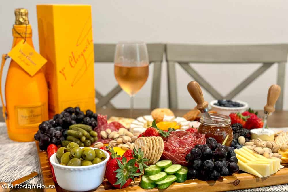 How to Build a Unique Wine Charcuterie Board with Cheese- the perfect appetizer tray with a bottle of wine 