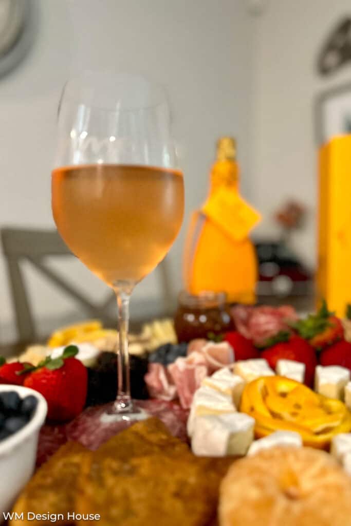 Glass of wine served with charcuterie 