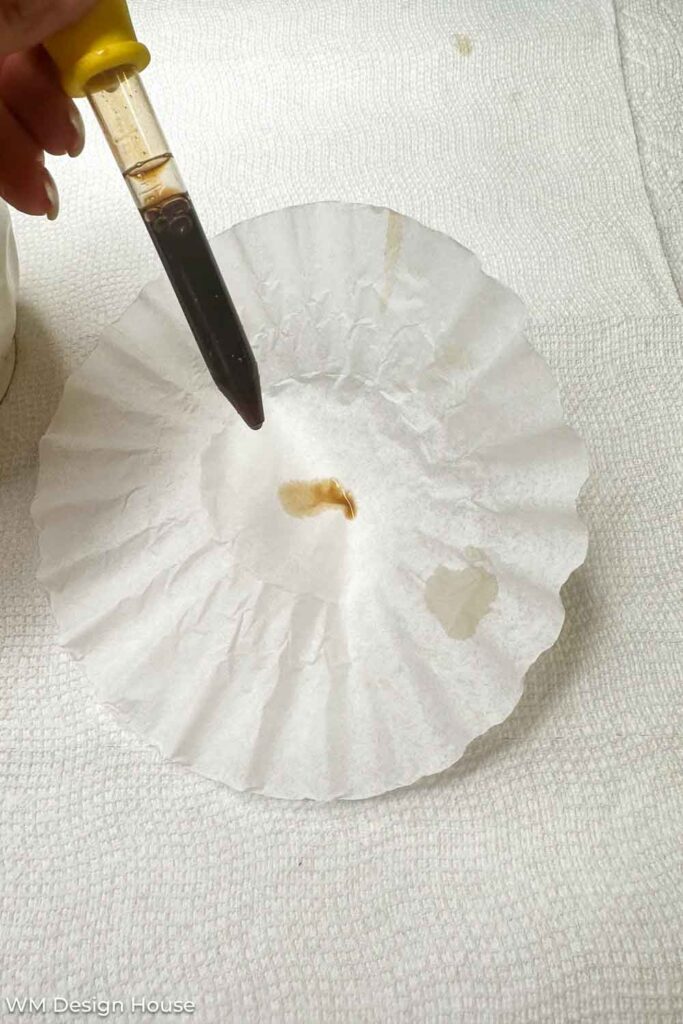 drip dying a coffee filter with coffee 