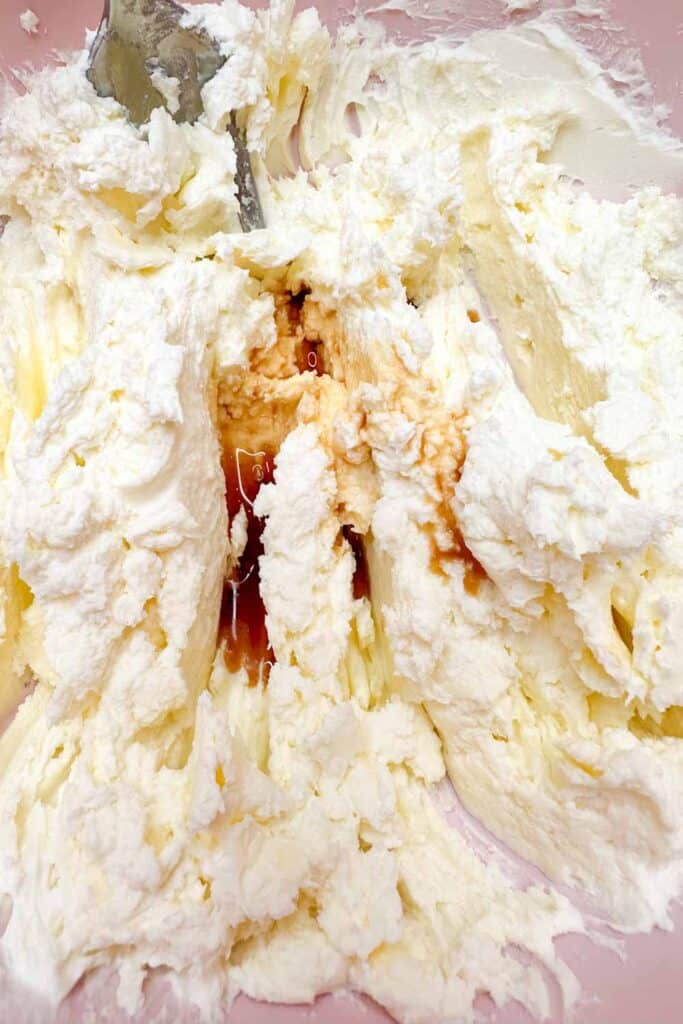Mixing cream cheese, butter and vanilla 