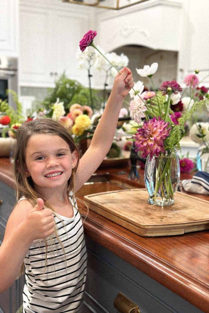 DIY Flower Bar- Little girl making a flower arrangement