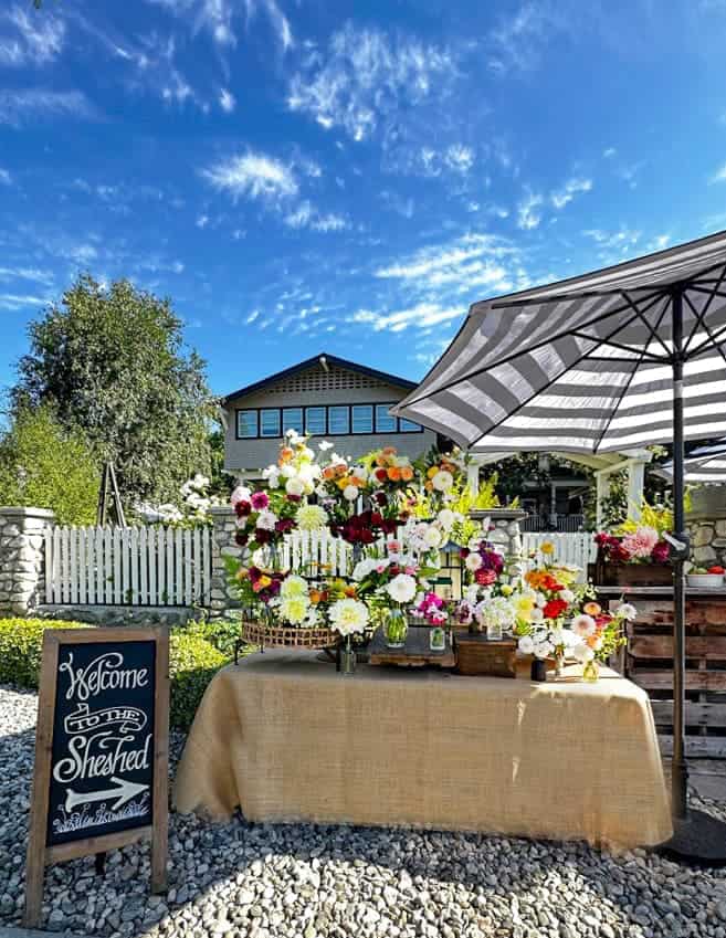 How to Create an Easy DIY Flower Bar for Any Occasion
-Tables set up for a DIY flower bar event