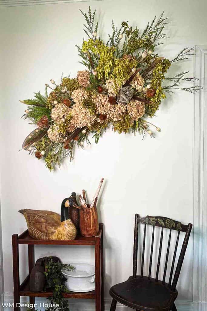 Arrangement hanging on the dining room wall