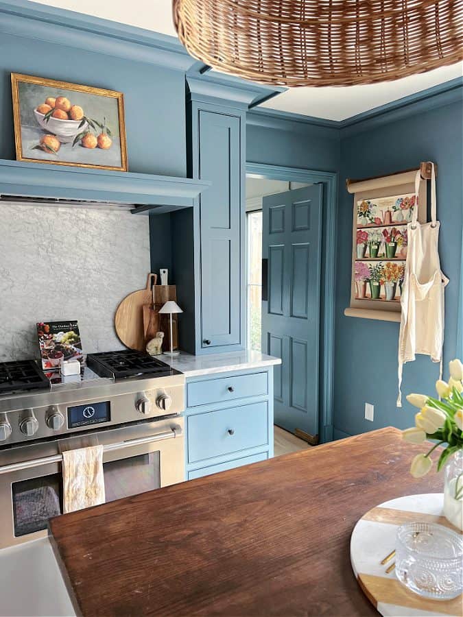 The best blue gray for kitchen cabinets: Blustery Sky by Sherwin Williams