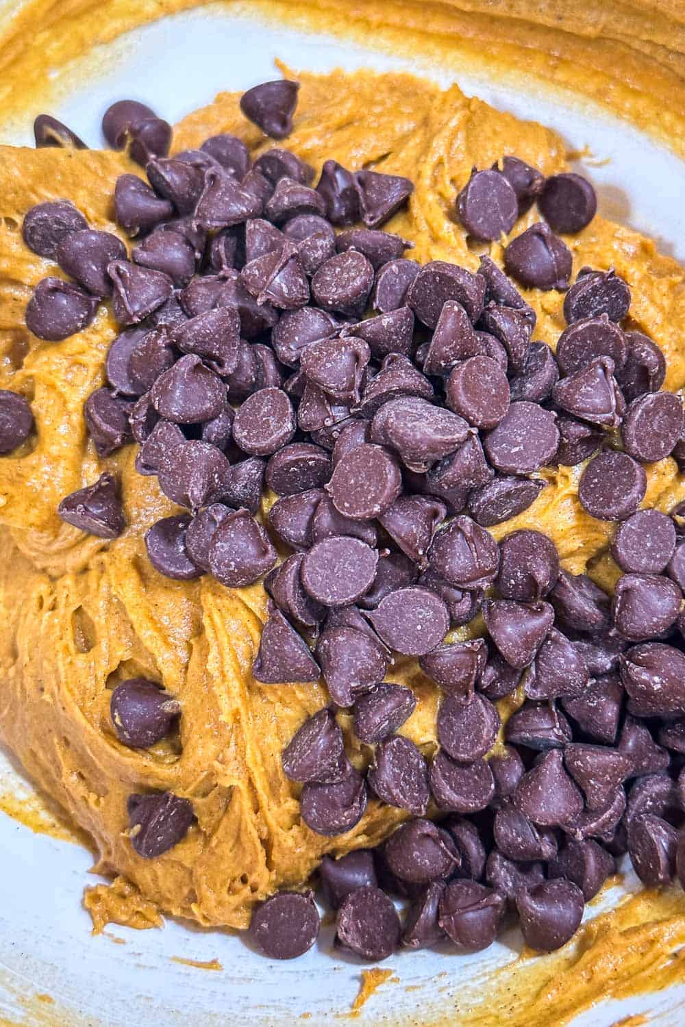 3 ingredient pumpkin Cookie dough made with a spice cake box mix and adding chocolate chips