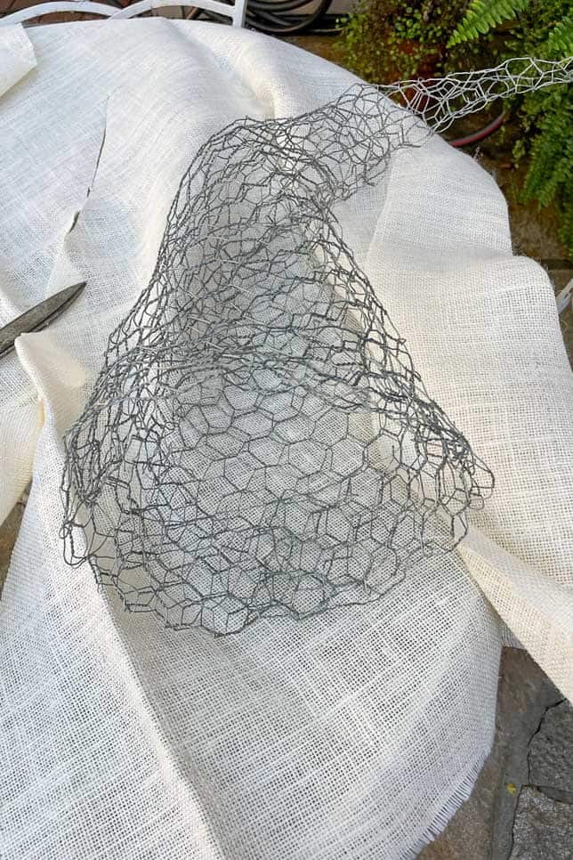 Wire frame is molded for the Cornucopia and we will now cover it with burlap.