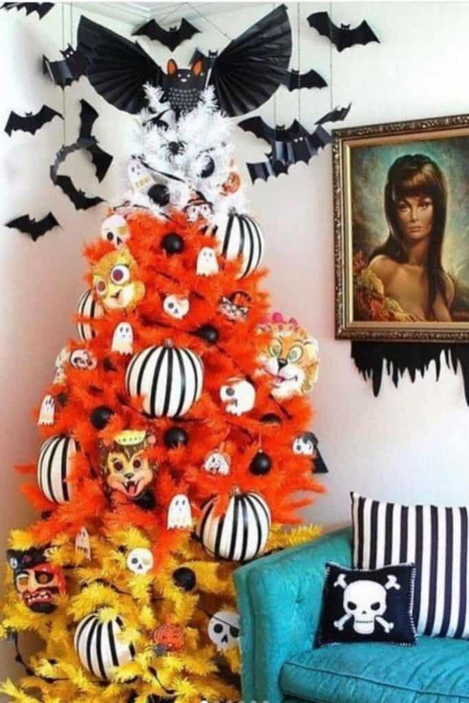 Candy Corn Halloween tree decorated with black and white decorations. 