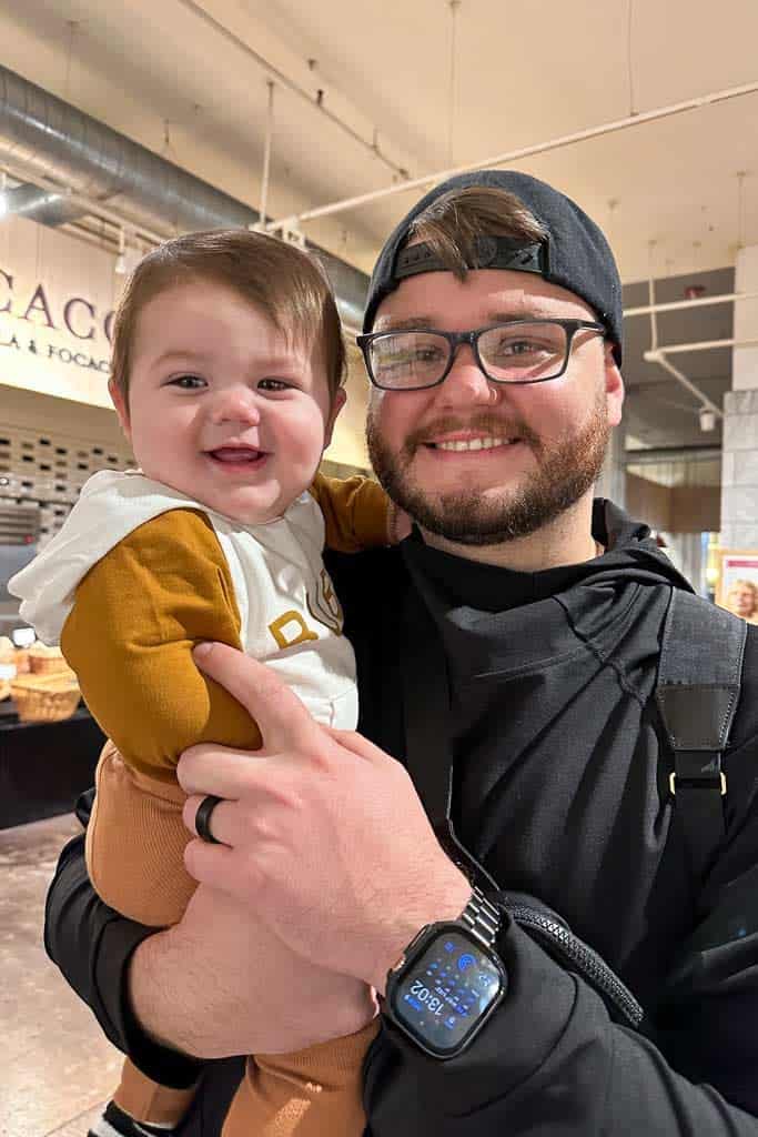 Father with a baby boy smiling 