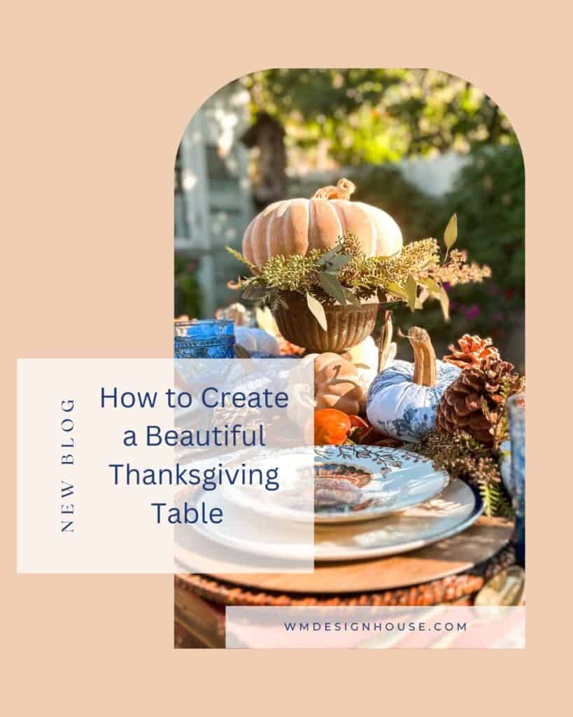 Fall table for Thanksgiving with blue and orange decor. 