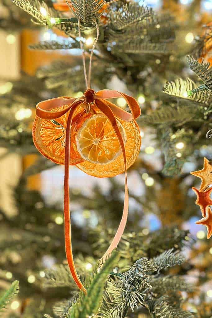 Dried orange slice ornament with a flowing velvet ribbon 