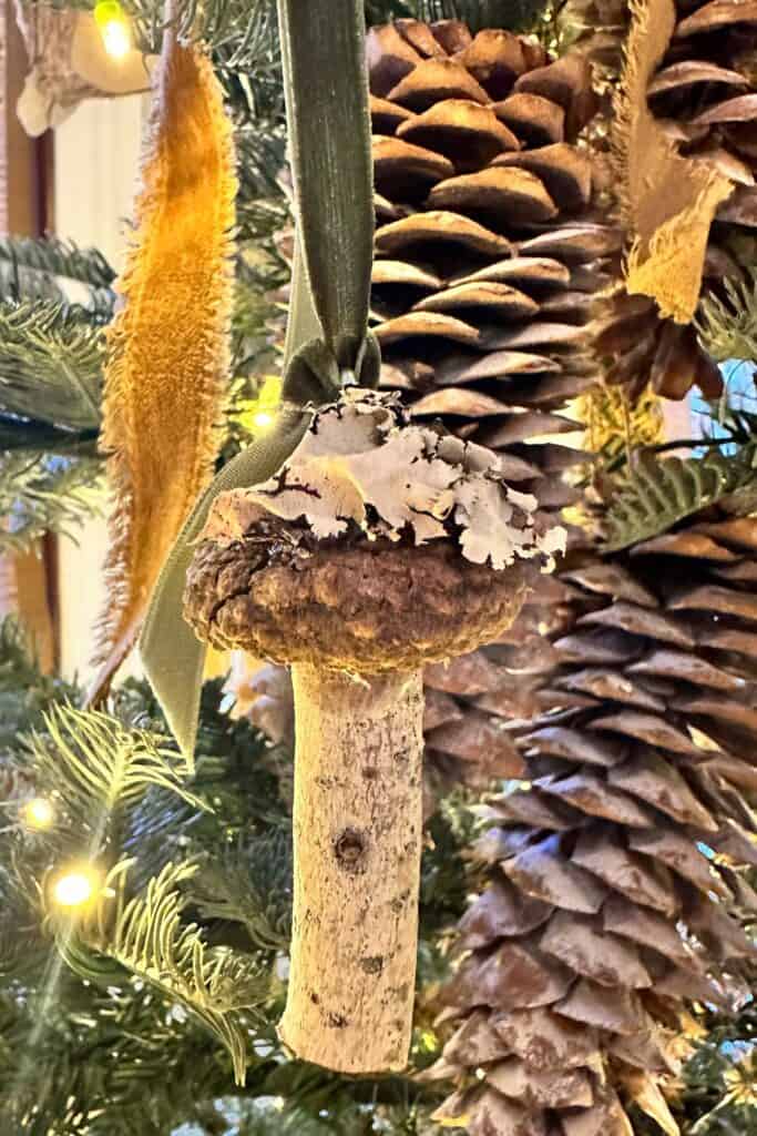 Wood DIY mushroom hanging in the Christmas tree and decorating ideas using green and gold.