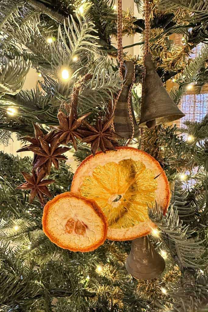 Star Anise and orange slices create an ornament to hang on the Christmas tree.