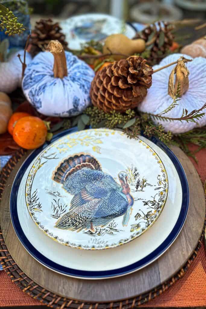 Beautiful turkey salad plates sitting on a Thanksgiving table.