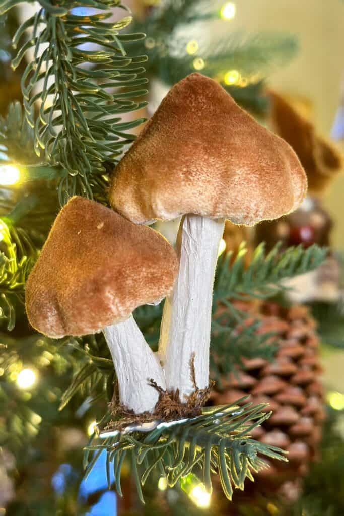 Velvet mushrooms sitting in the woodland Christmas tree
