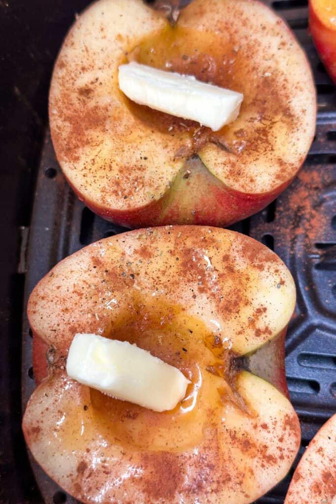 Spiced apples in the air fryer, ready to bake.
