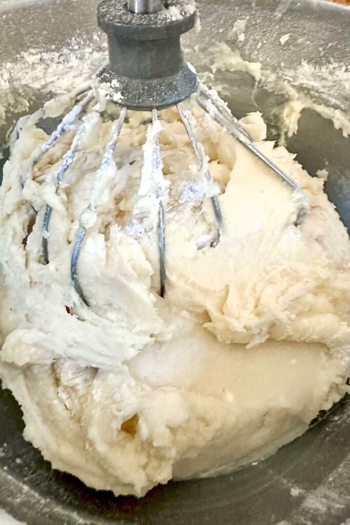 You are mixing Mastro's copycat butter cake batter until fully incorporated.