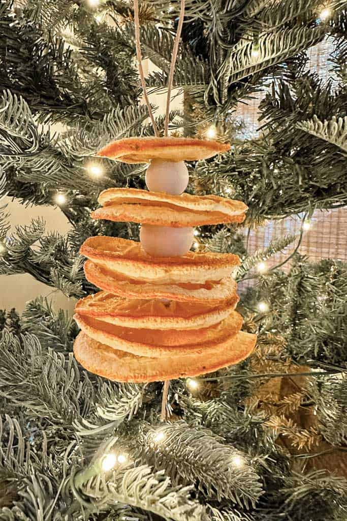 Dried stacked orange Ornament hanging on the Christmas tree.