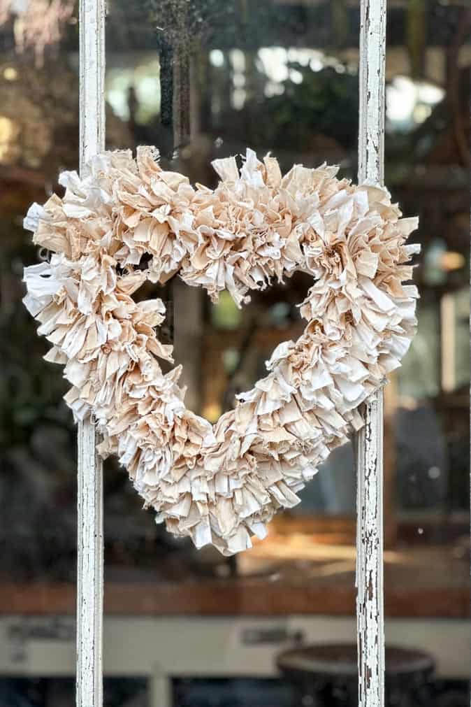DIY rag wreath hanging on the door