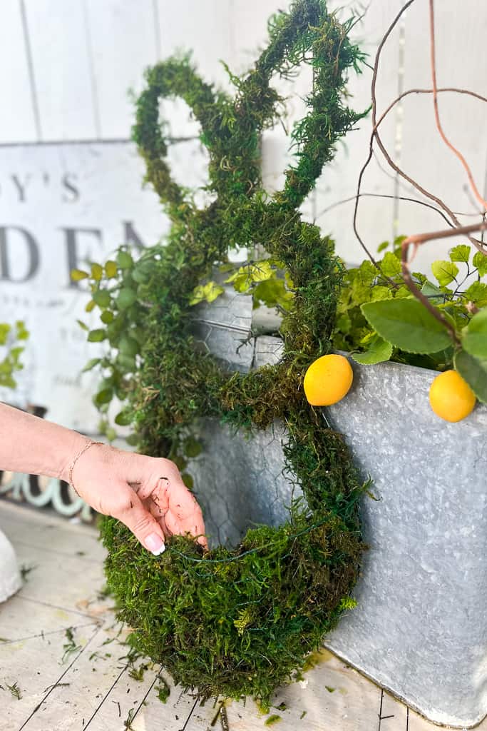 I am showing you how to add moss to your diy dollar tree easter wreath. 
