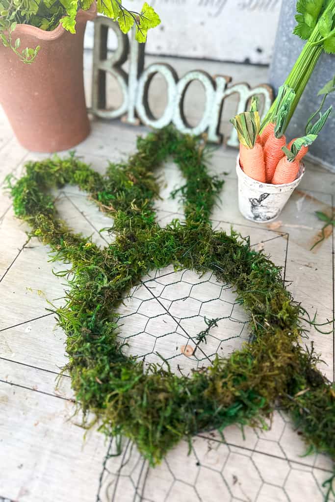 Bunny rabbit wire wreath frame with moss wired on. 