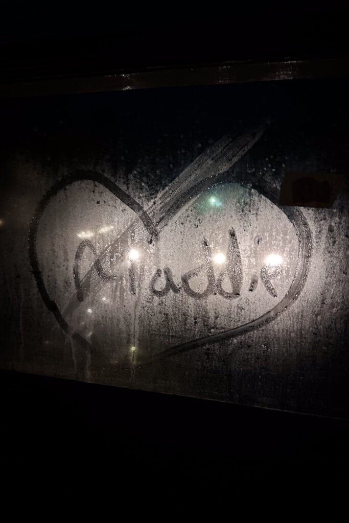 Maddie drew her name on the window!