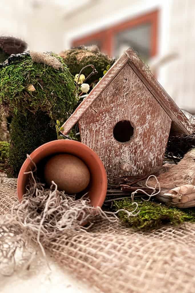 Clay pots used as an egg holder to decorate a natural inspired Easter Table. 