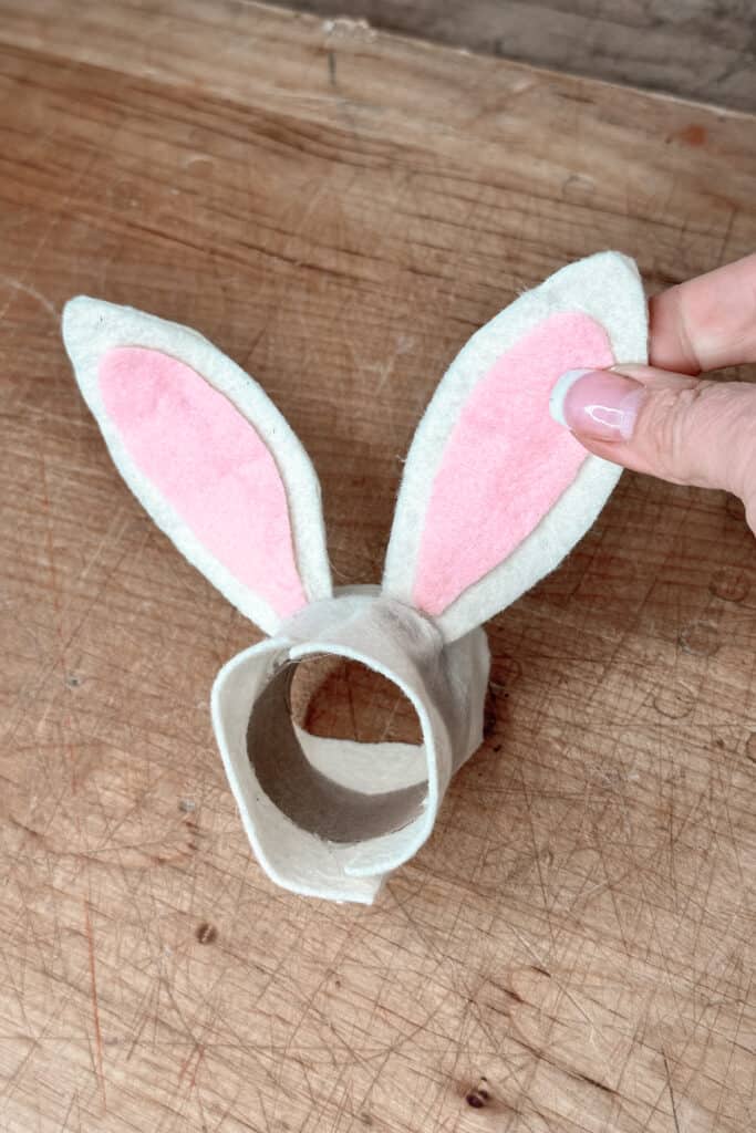 Showing the rabbit ears attached in preparing to make napkin rings.