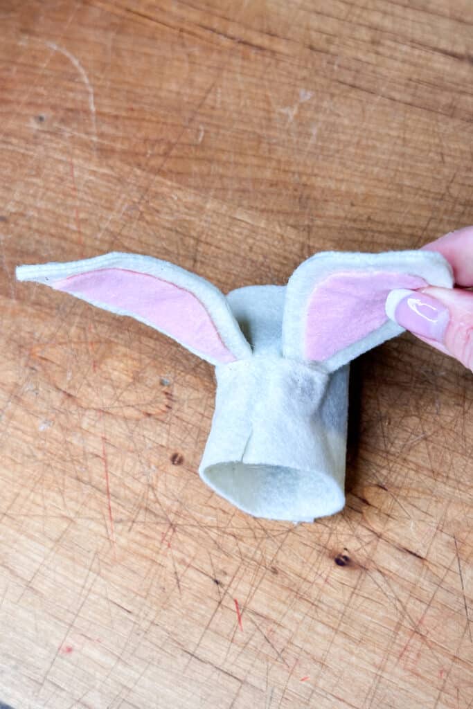 Showing the rabbit ears attached in preparing to make napkin rings.