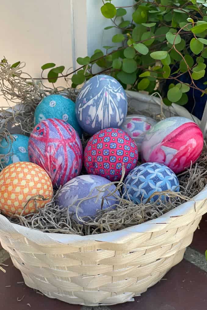 Silk tie Dyed eggs in a basket.