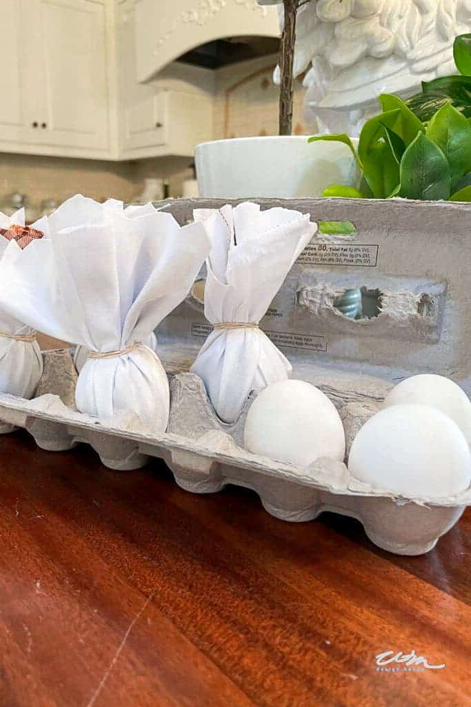Eggs wrapped in silk and cotton before dying