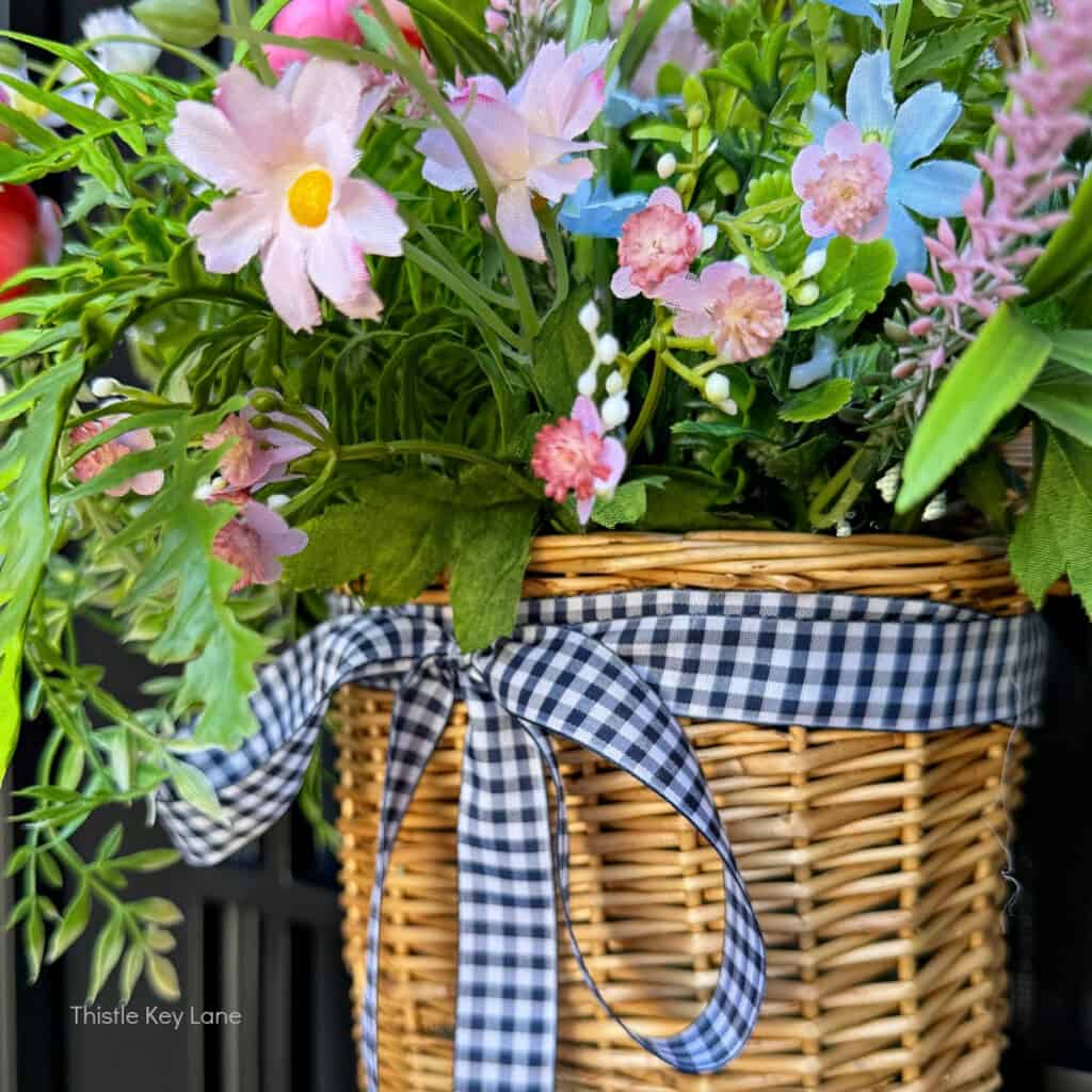 faux flower basket on door 