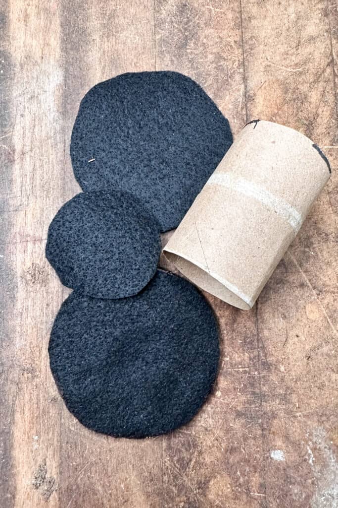 Pieces cut to make a diy felt top hat for easter napkin ring.