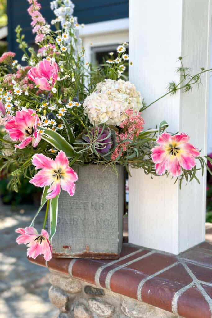 DIY Flower arrangement with pink tulips and white hydrangeas.