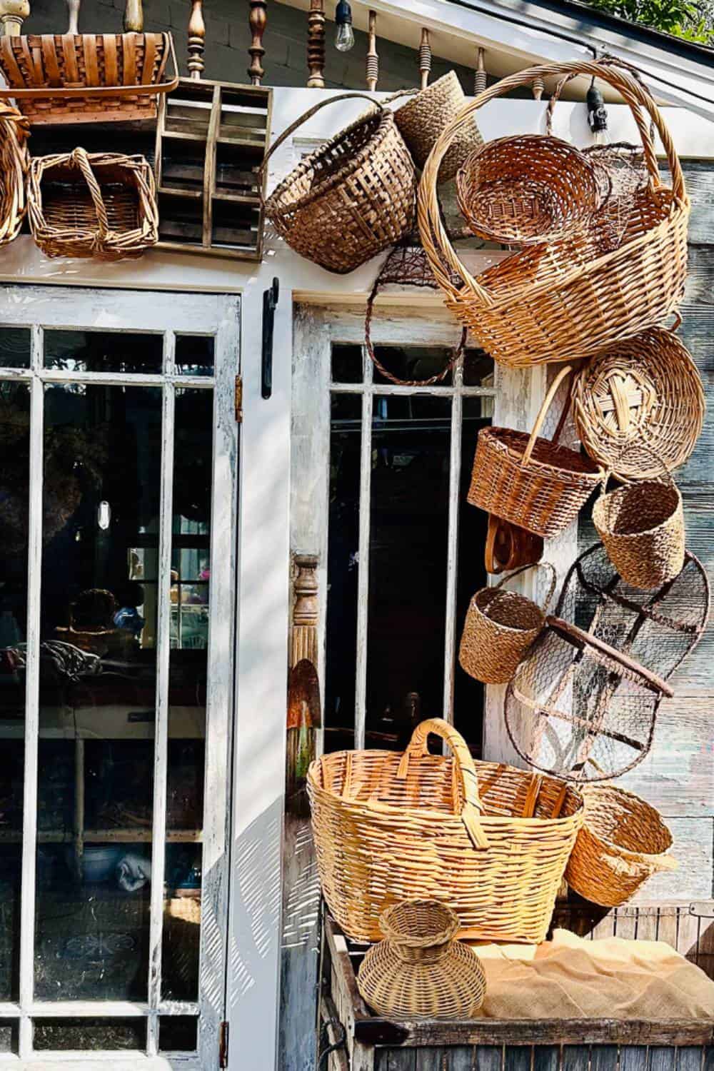 Close-up view of thrifted arch basket surrounding the exterior of the She Shed doors for summer