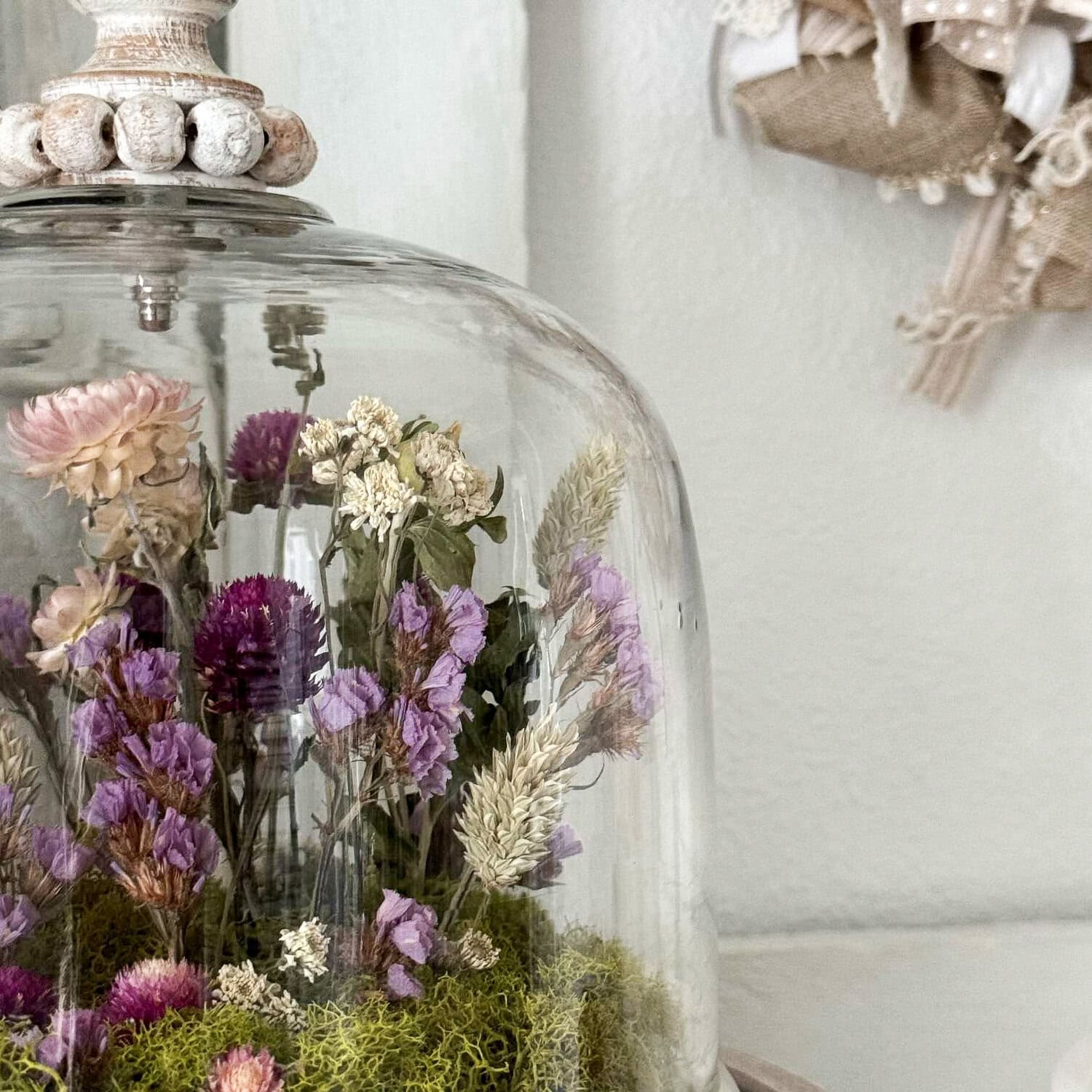 Dried flowers in a cloche