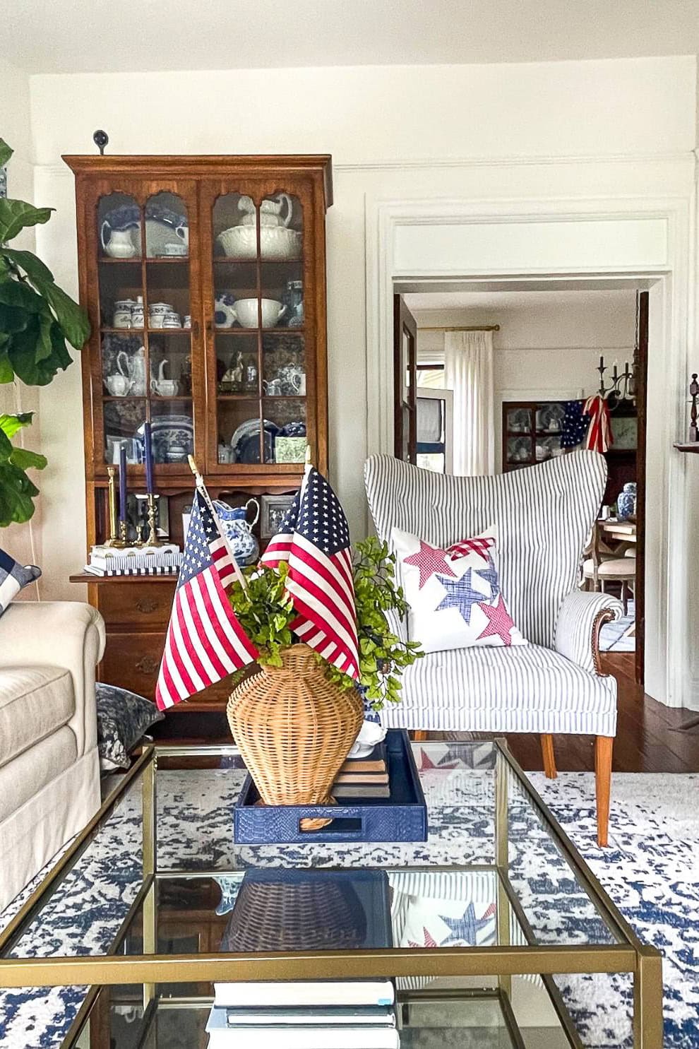 Decorating with American Flags to create a patriotic vignette on the coffee table in the living room