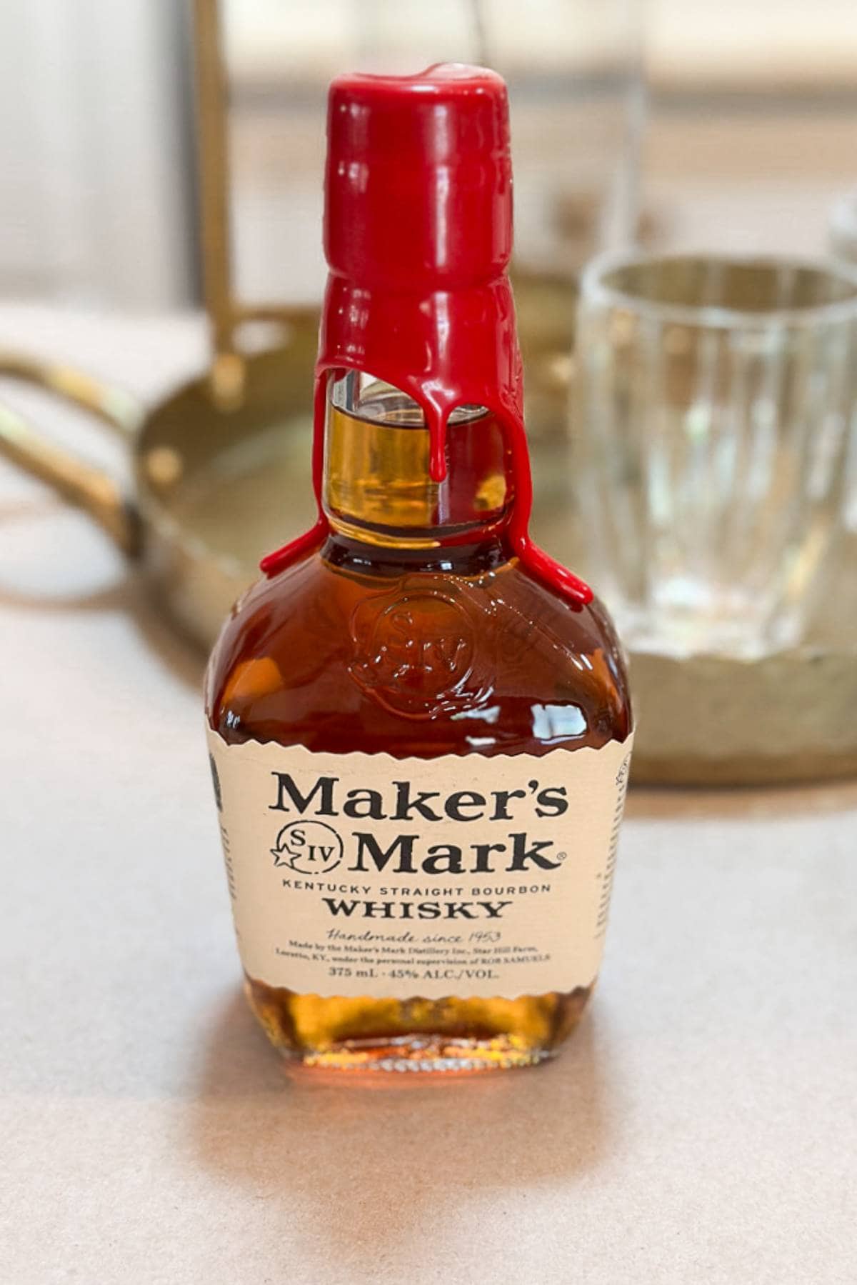 Maker's Mark to make a smoked Old Fashioned cocktail.