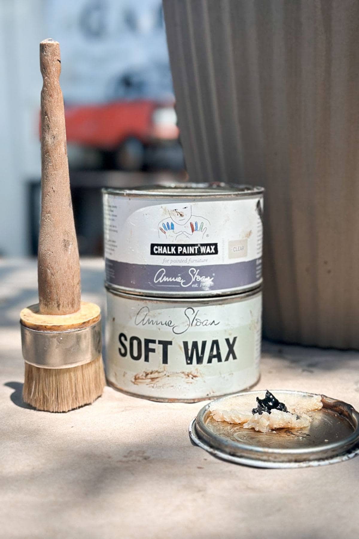 Furniture wax was used to age the cement flower pot. 