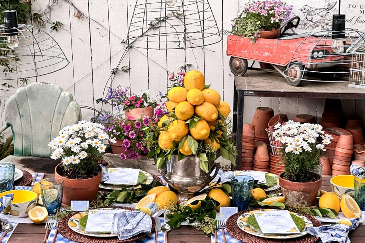 Summer tablescape with lemons set outside in the garden