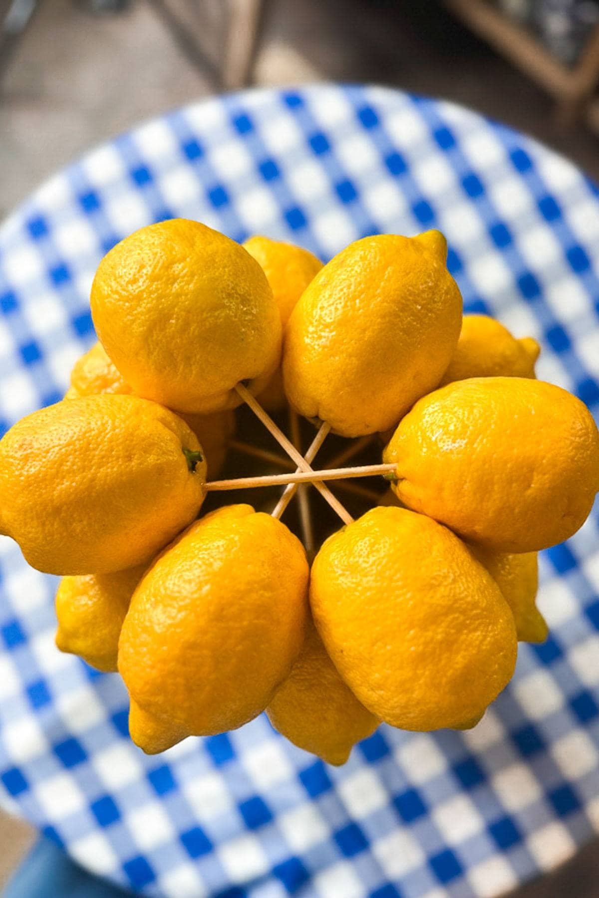 Layers of lemons are put together with skewers to create a lemon tree centerpiece. 