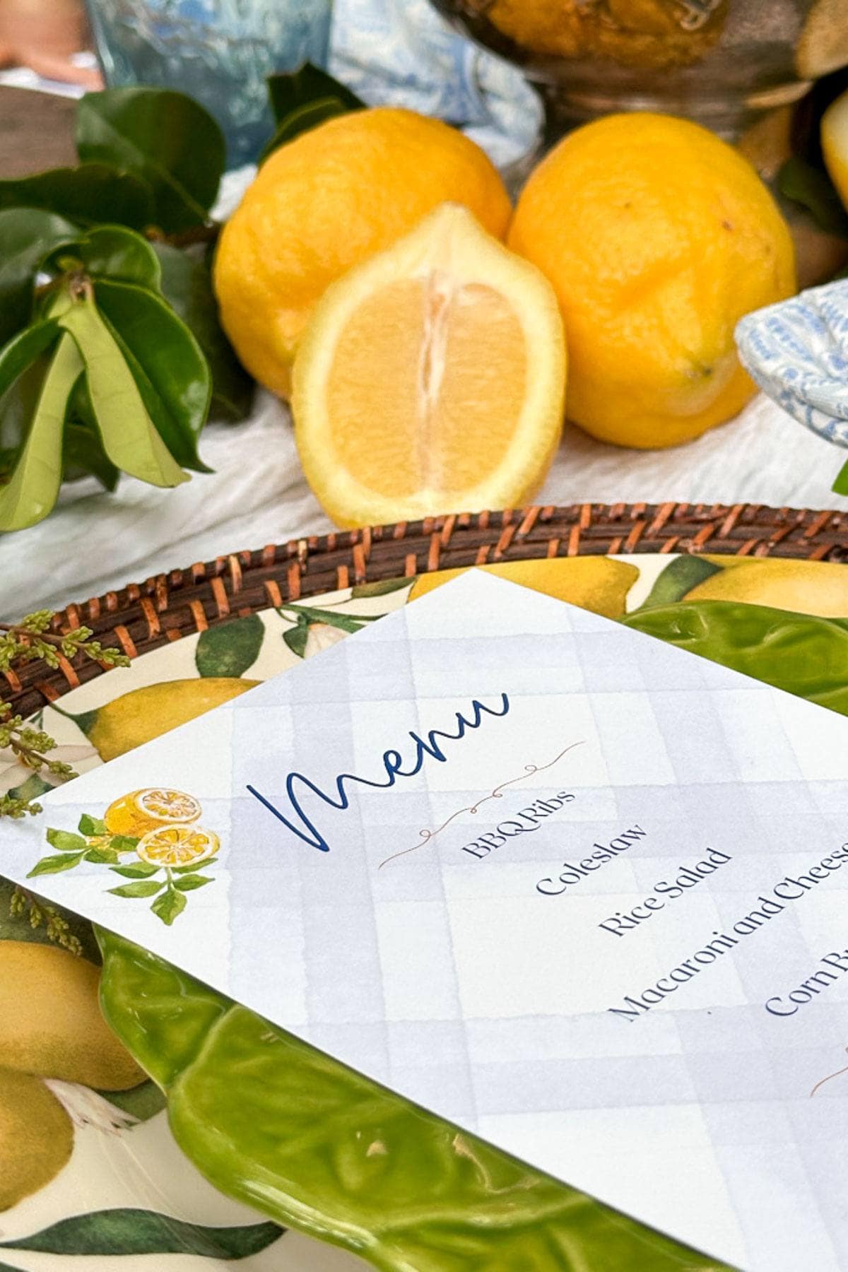 Free printable blue and white menu with lemons on it for a summer dinner party