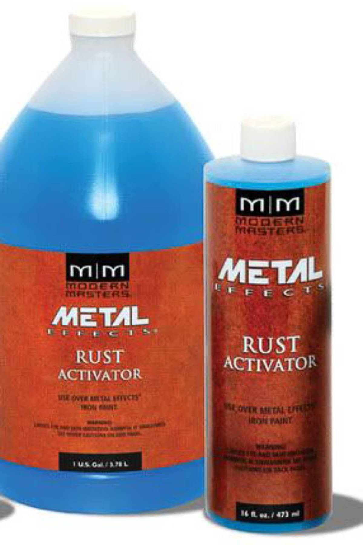 Two bottles of Modern Masters Metal Effects Rust Activator, perfect for crafting eerie Halloween decorations. The larger bottle holds 1 gallon, while the smaller has 16 ounces of blue liquid. Both feature a red-brown label with the brand and product name, ideal for DIY Halloween place card holders.