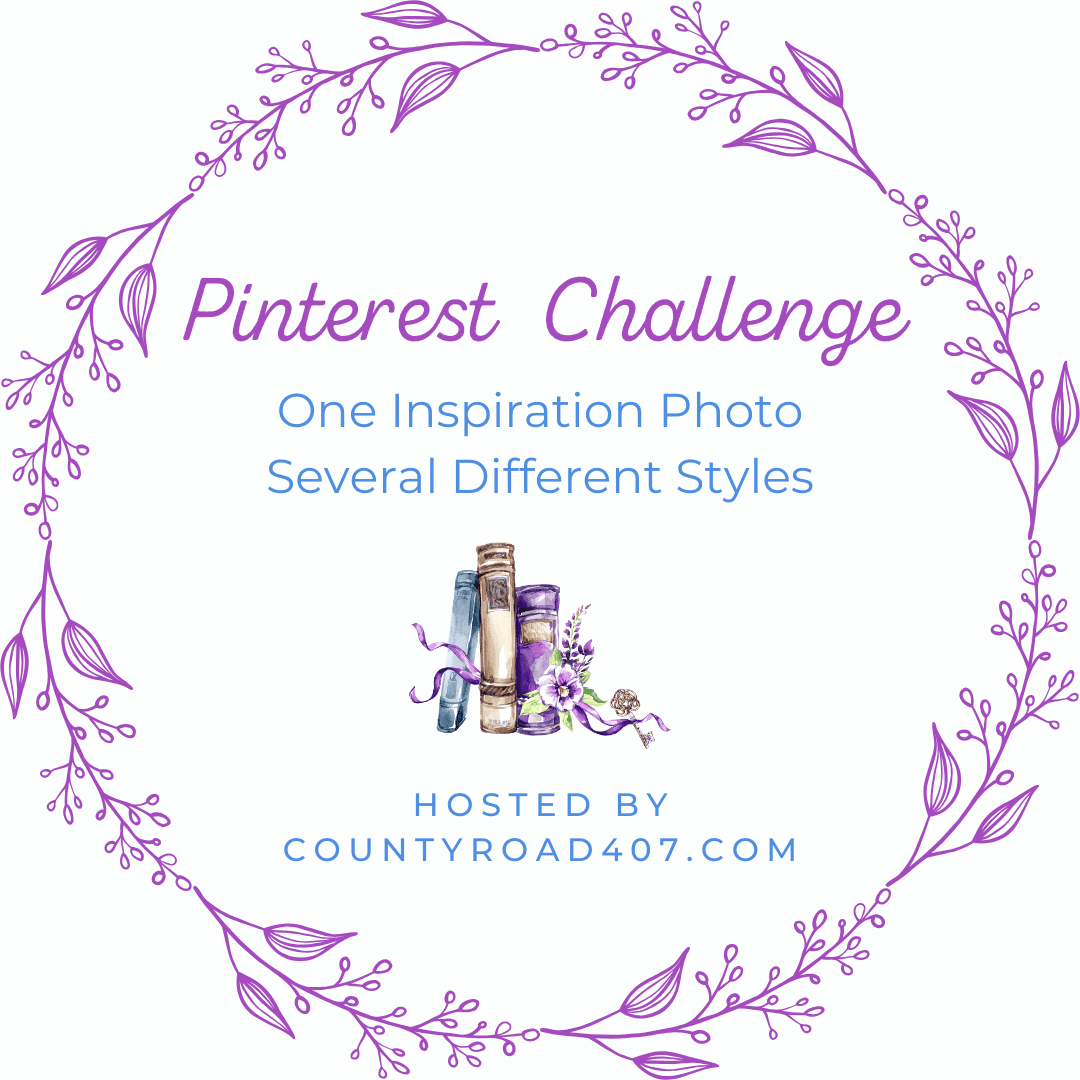 A decorative graphic with a purple leafy border. Text reads: "Pinterest Challenge. One Inspiration Photo, Several Different Styles. Hosted by countyroad407.com". In the center, there are watercolor books and flowers.