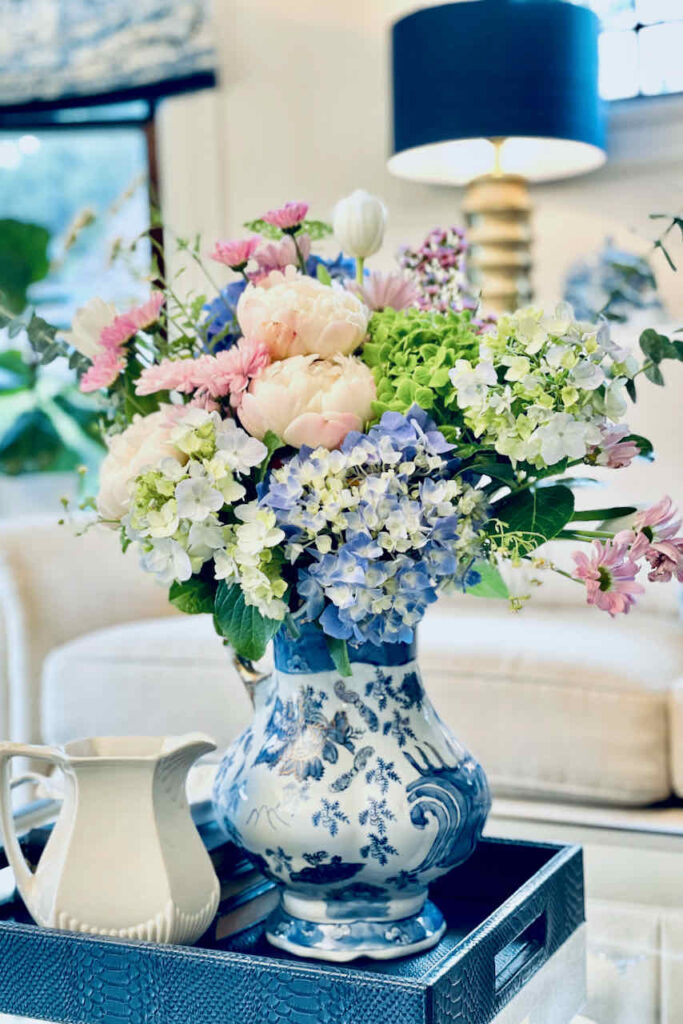 flower arrangement with hydrangeas of blue, pink and white in the living room