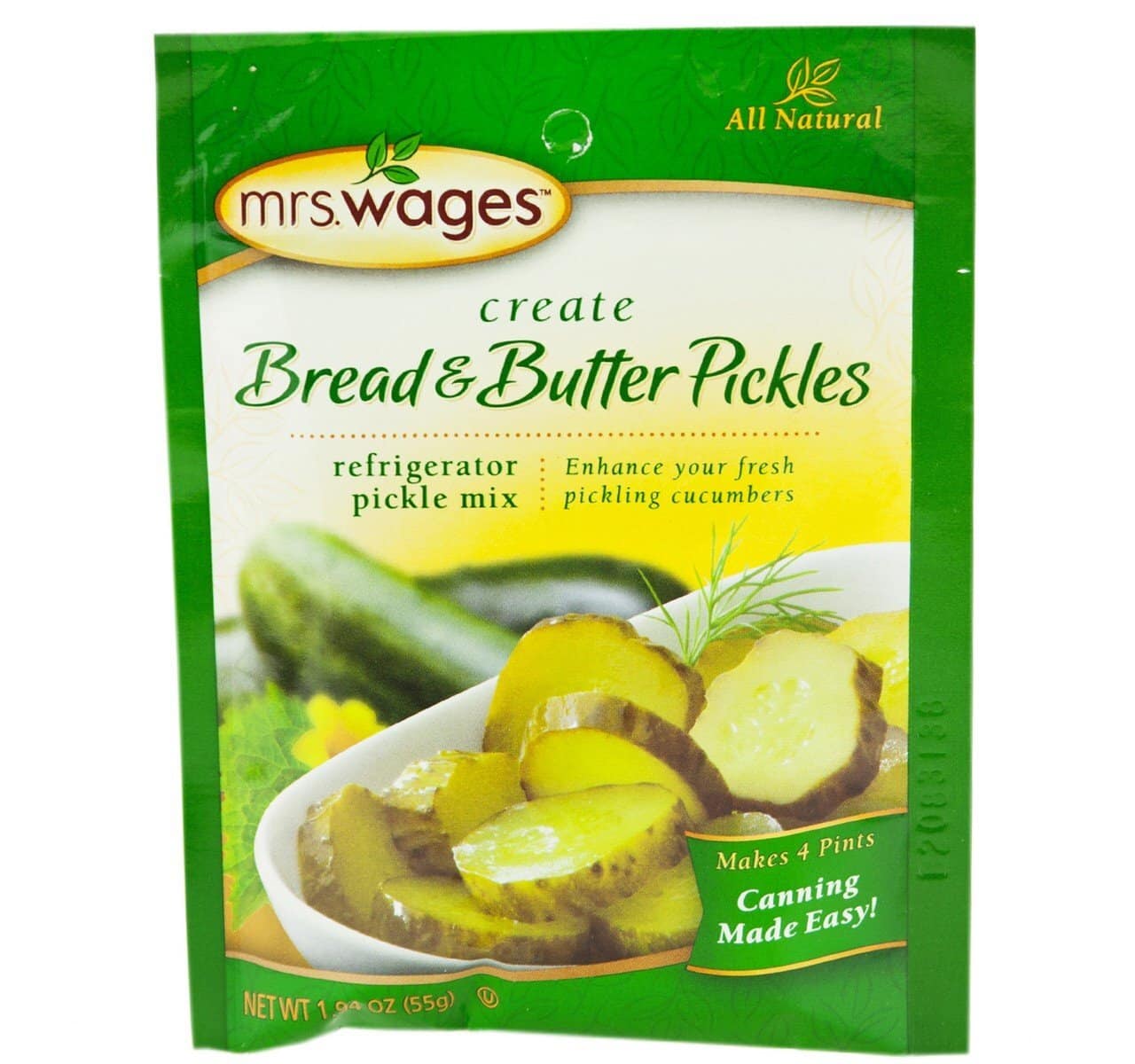 A green packet of Mrs. Wages Bread & Butter Pickles refrigerator pickle mix, featuring a photo of sliced pickles on a plate. The packaging highlights "All Natural" and "Canning Made Easy!" in yellow text.