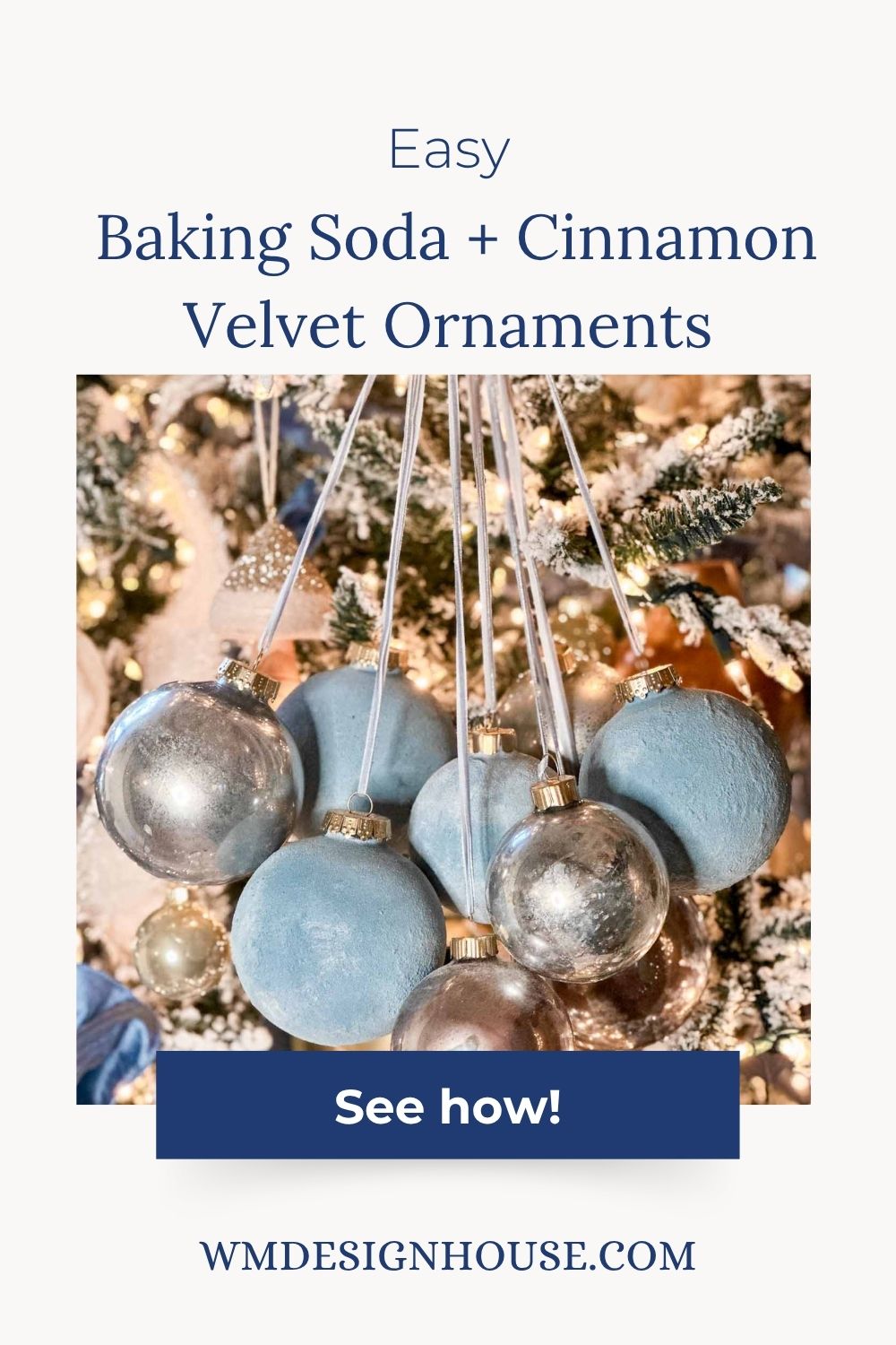 Blue and silver DIY Velvet Ornaments, crafted from baking soda and cinnamon, hang from a snowy, decorated tree. Text reads: “Easy Baking Soda + Cinnamon Velvet Ornaments. See how! WMDESIGNHOUSE.COM.”.