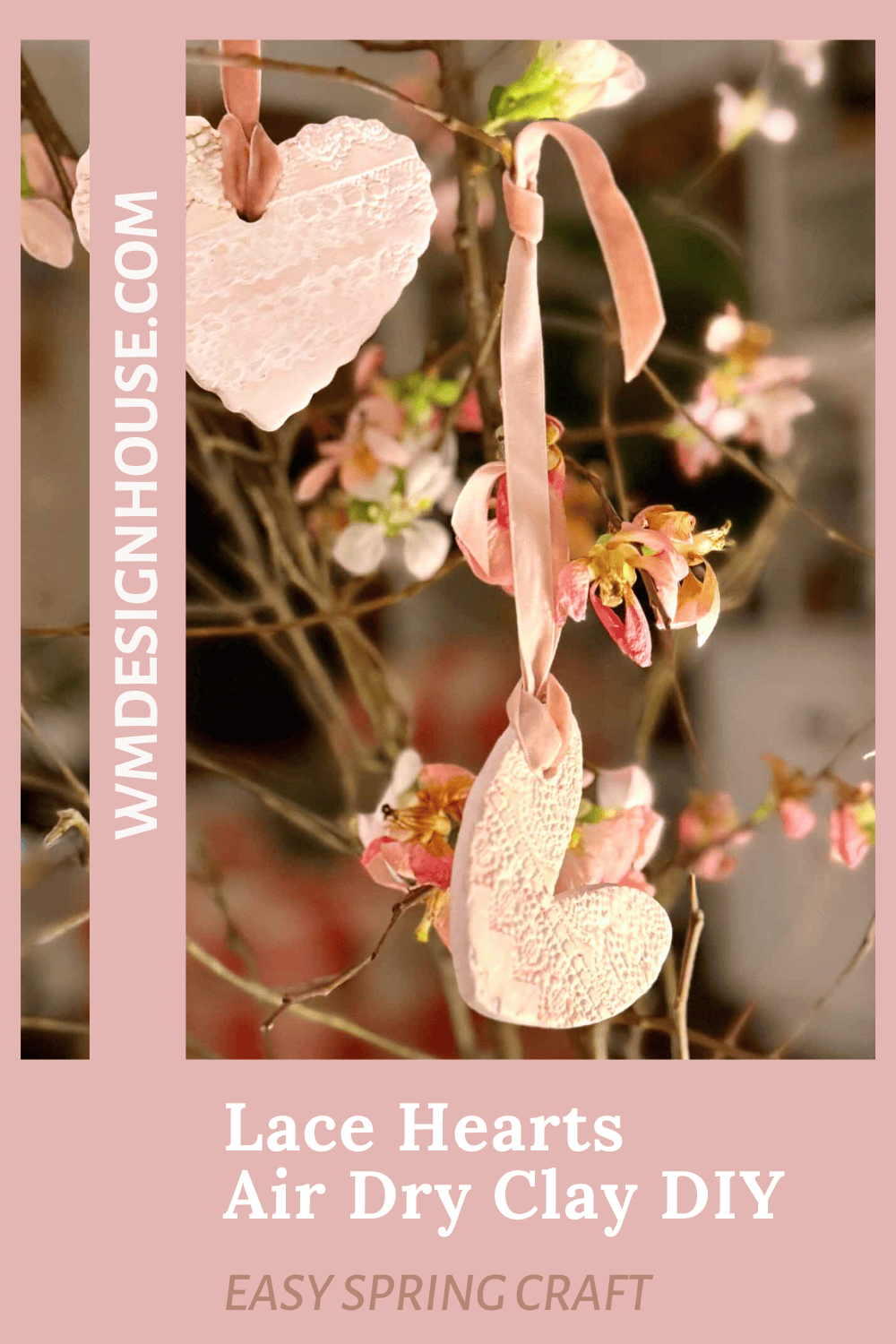 Handmade Lace Hearts ornaments crafted from air dry clay hang from pink ribbons on blossoming branches. The text reads "Lace Hearts Air Dry Clay DIY, Easy Spring Craft, WMDESIGNHOUSE.COM.