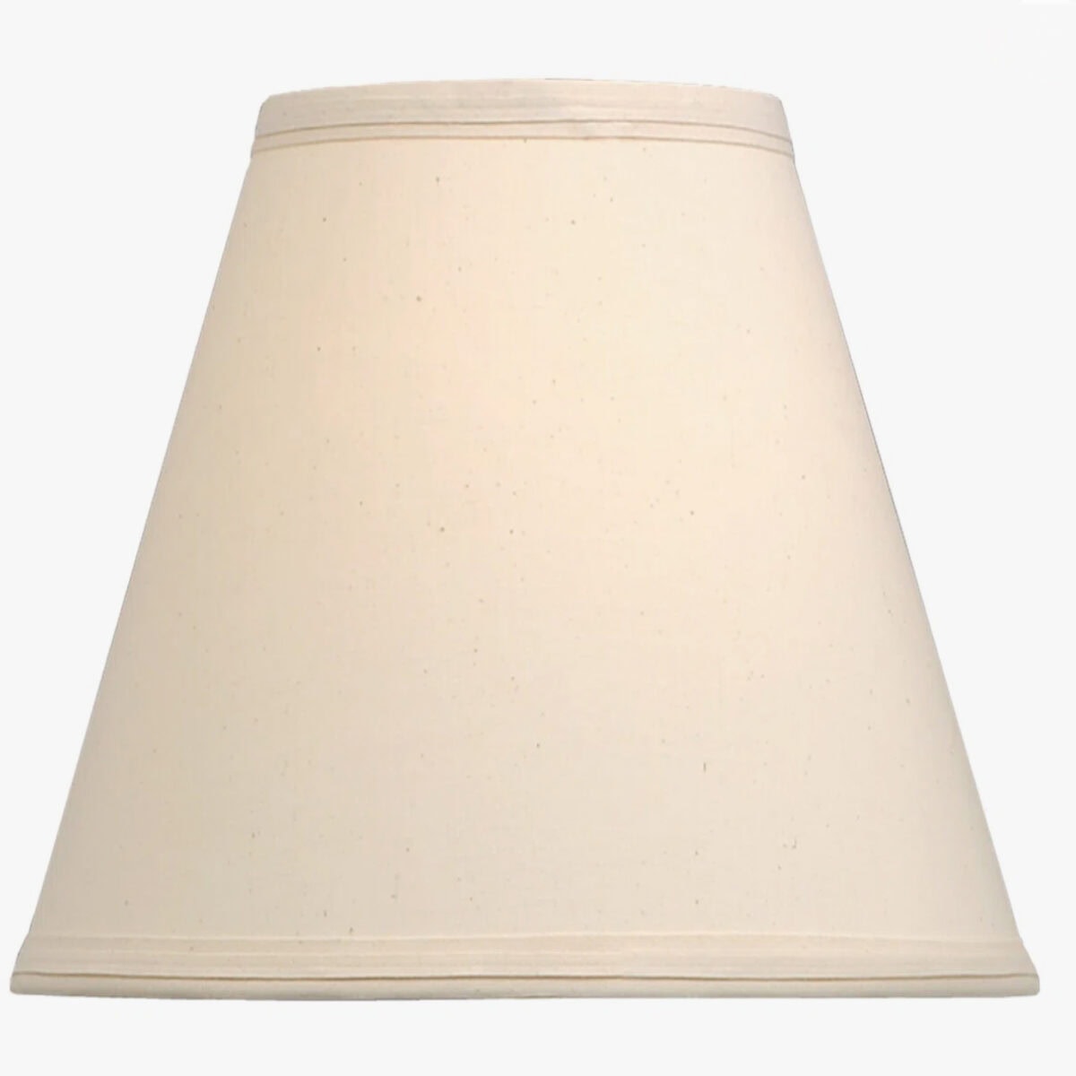 A plain, beige, cone-shaped lampshade with a smooth texture, photographed against a white background—the perfect candidate if you're looking for the best way to line a lampshade with leftover wallpaper.