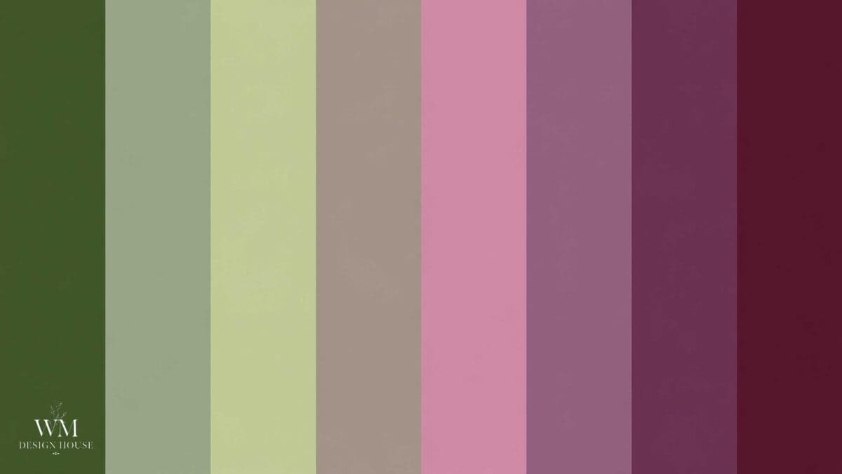 Eight vertical color stripes in shades of olive green, light green, beige, taupe, pink, mauve, purple, and dark burgundy evoke the fresh elegance of a greenery table runner. A small “WM Design House” logo is in the bottom left corner.