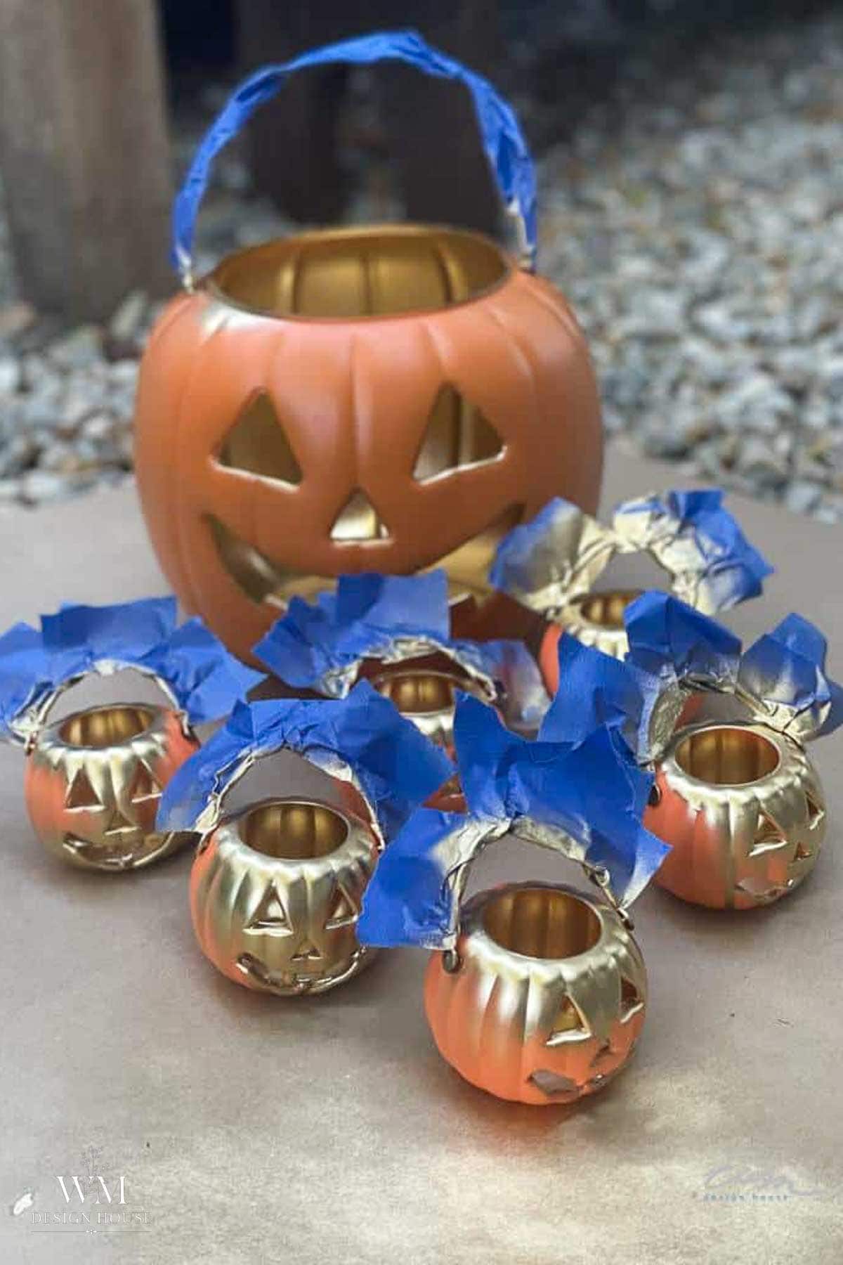 Interior of a plastic pumpkin bucket sprayed metallic gold to reflect candlelight